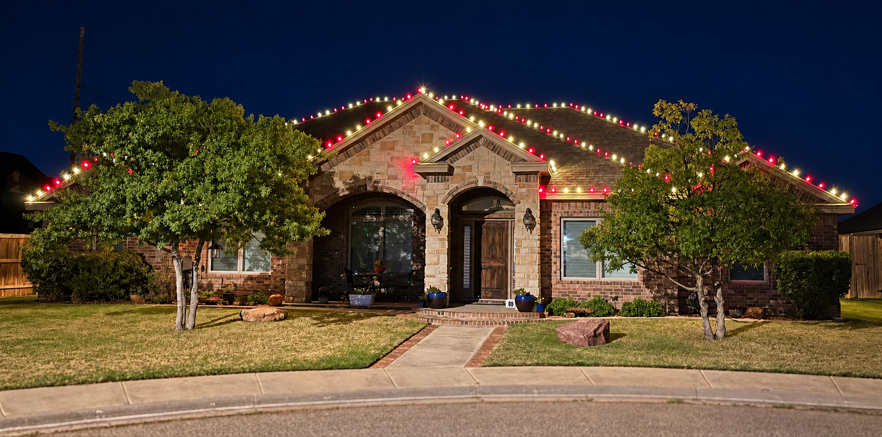 RESIDENTIAL holiday lighting installation